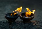 photo of two oil lamps