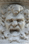 antique carving of bully