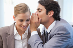 photo of whispering and sidebar conversations