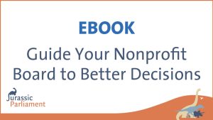 Cover of an eBook titled "Guide Your Nonprofit Board to Better Decisions" from Jurassic Parliament, featuring a dinosaur logo in the bottom left corner and illustrations in the bottom right corner.